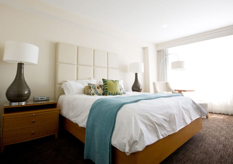 Double bed in the modern interior room